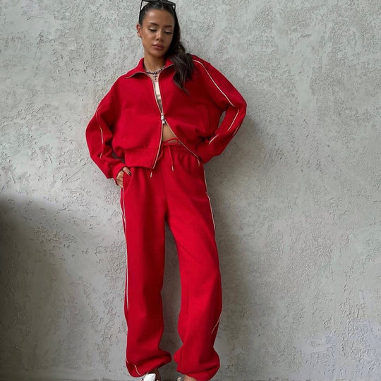 Damen lässiges Sweatset mit Stehkragen Reißverschluss gekürzter Jacke und hochtaillierter Schlaghose Nord Taschen