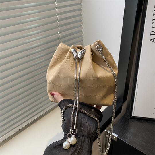 Damen Handtasche mit elegantem Kordelzug und detaillierter Schlangenprägung Nord Taschen