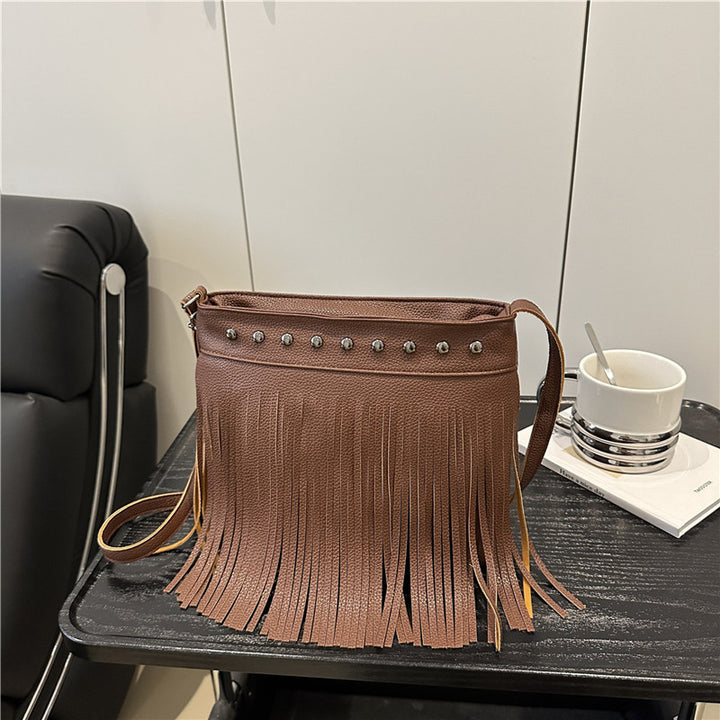 Damen Umhängetasche mit Fransen und Nieten Nord Taschen