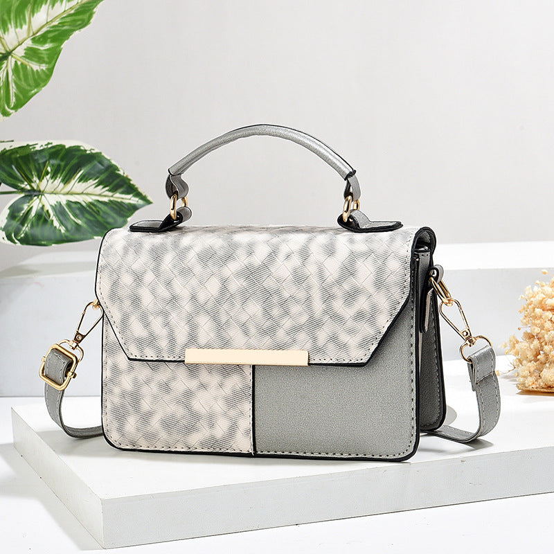 Damen modische Umhängetasche mit strukturiertem Design und goldenen Akzenten Nord Taschen