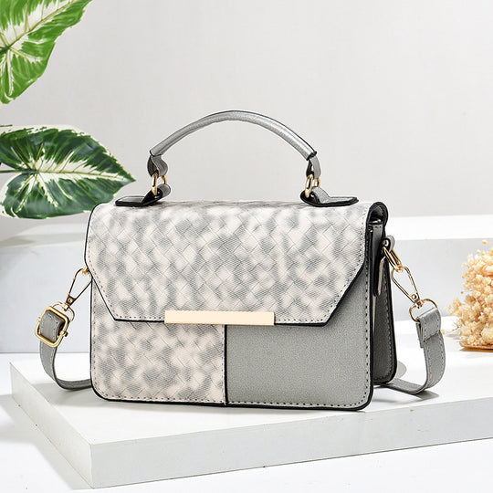 Damen modische Umhängetasche mit strukturiertem Design und goldenen Akzenten Nord Taschen