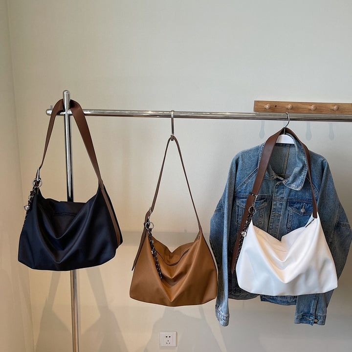 Damen elegante Hobo-Tasche mit weichem Leder und trendigem Detail Nord Taschen