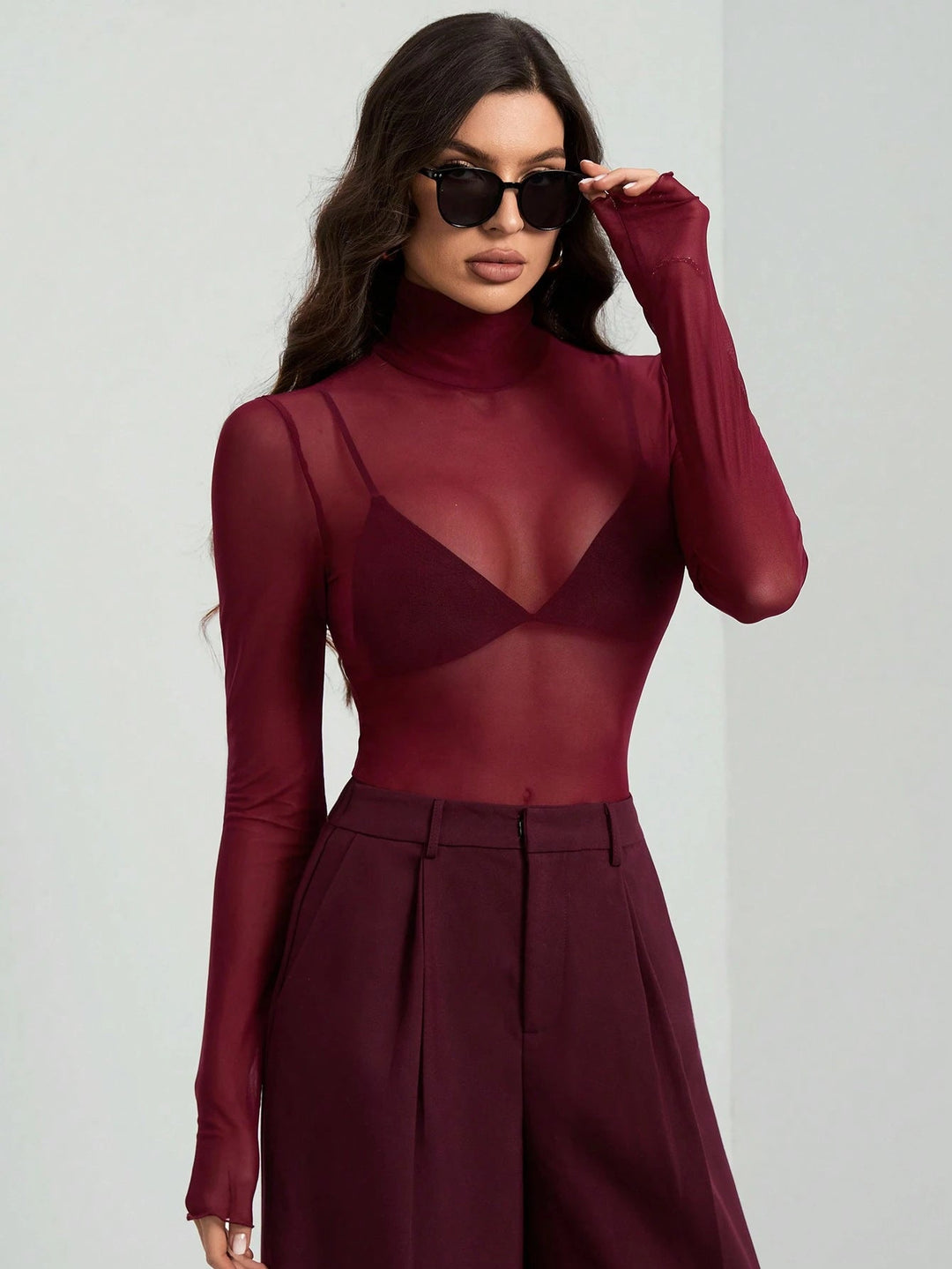 Damen Transparente Turtleneck-Bluse mit figurformendem Schnitt Nord Taschen