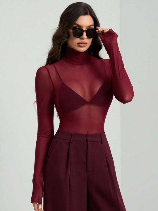 Damen Transparente Turtleneck-Bluse mit figurformendem Schnitt Arvani