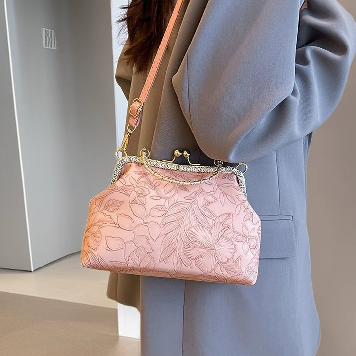 Damen elegante Handtasche mit floralem Relief und goldenen Akzenten Nord Taschen