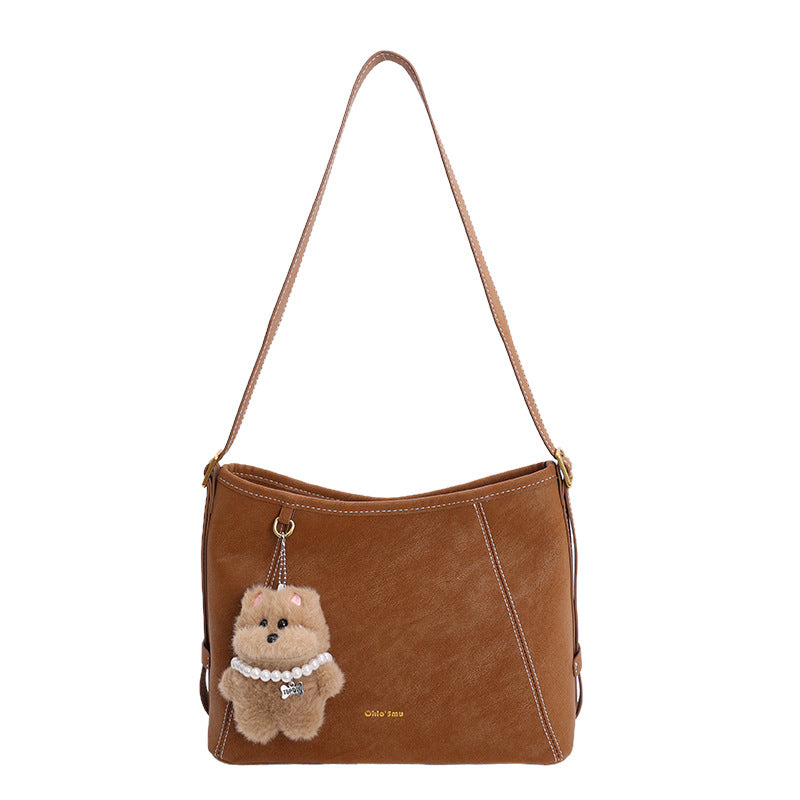 Damen Schultertasche mit verspieltem Tieranhänger und edlem Material Nord Taschen