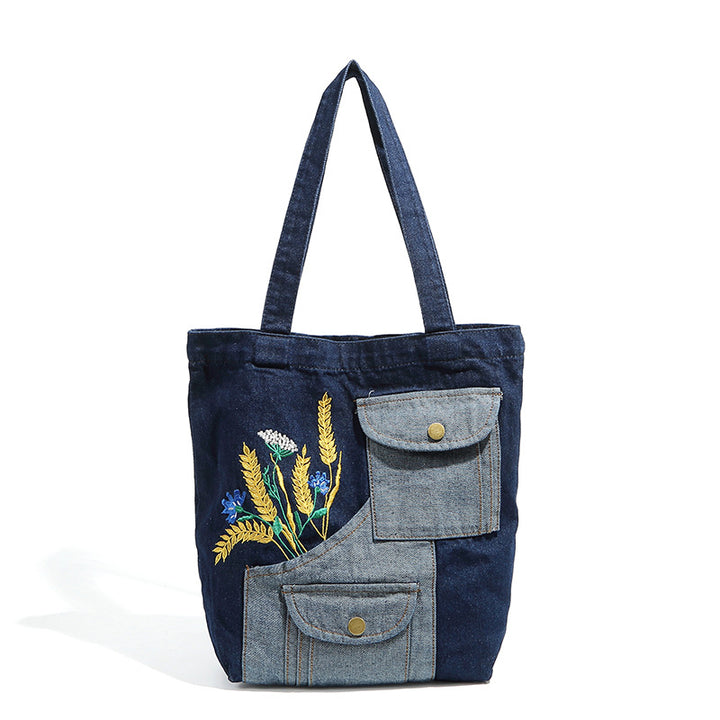Damen Einkaufstasche mit floralem Stickmotiv und praktischen Außentaschen Nord Taschen