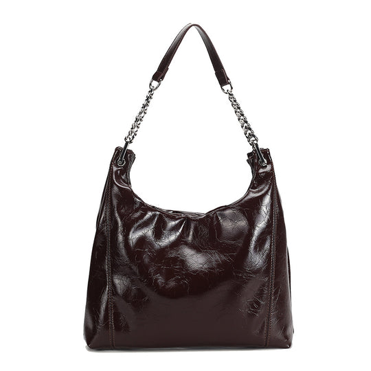 Damen Hobo-Tasche aus glänzendem Kunstleder mit luxuriösen Kettenakzenten Nord Taschen
