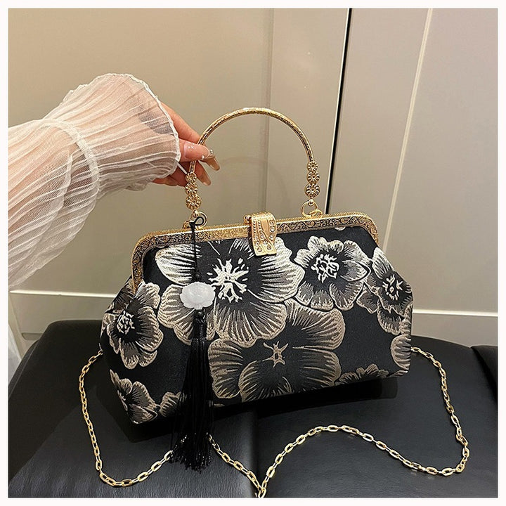 Damen elegante Clutch-Tasche mit floralem Druck und goldenen Akzenten Nord Taschen