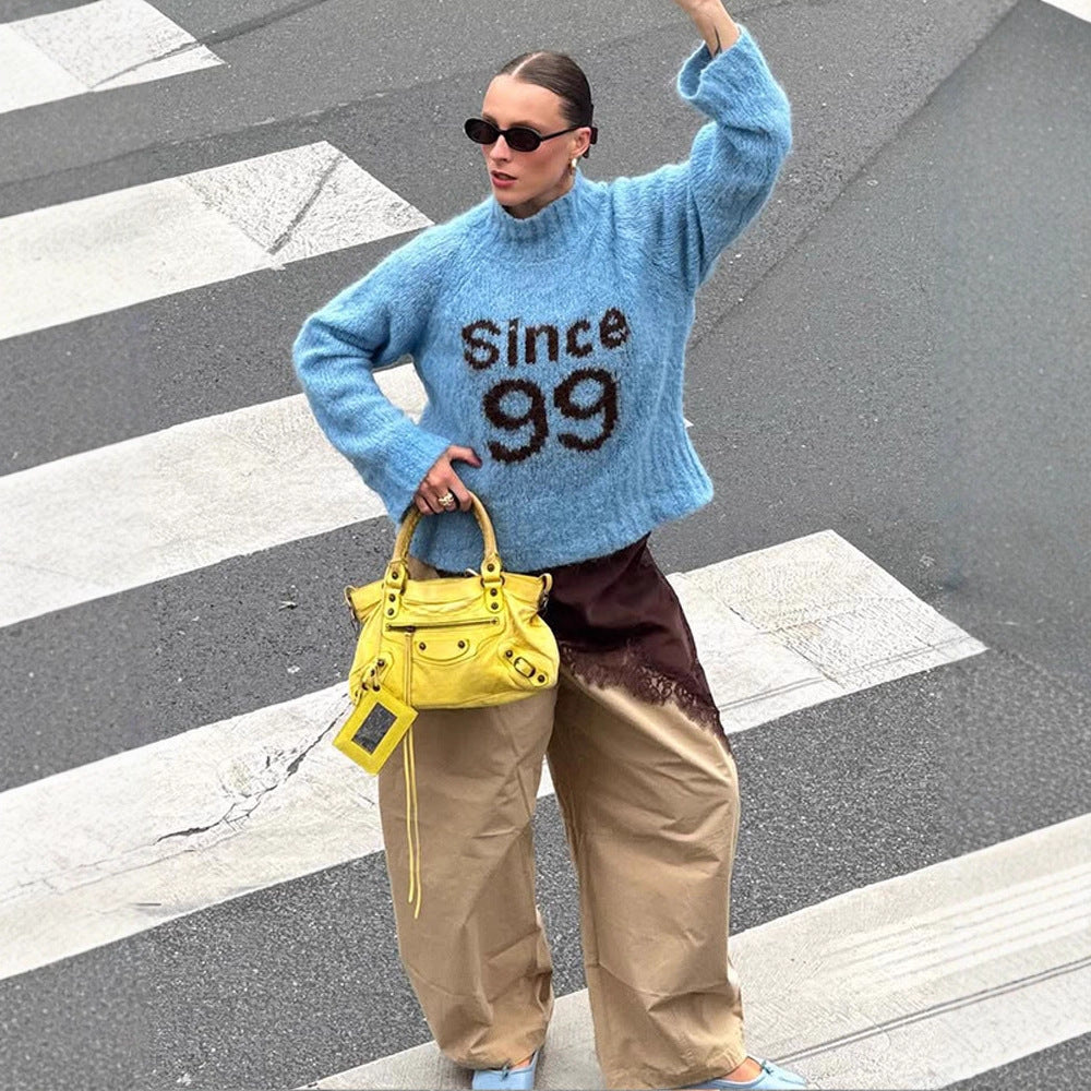 Damen kuscheliger Oversize-Mohairpullover mit hohem Rollkragen und Statement-Logo Nord Taschen
