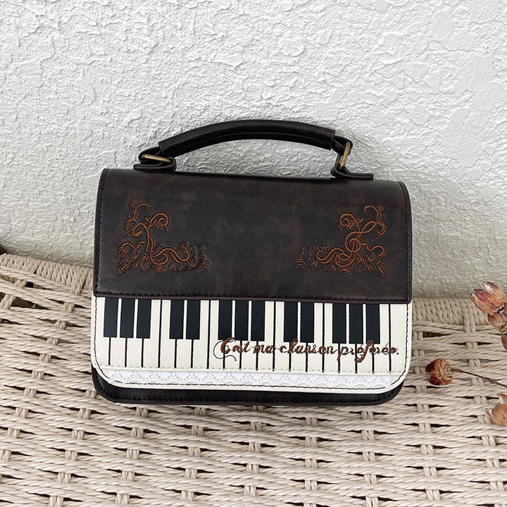 Damen Handtasche mit Klaviermotiv Nord Taschen