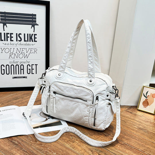 Damen Handtasche mit strukturiertem Design und dekorativen Metallakzenten Nord Taschen