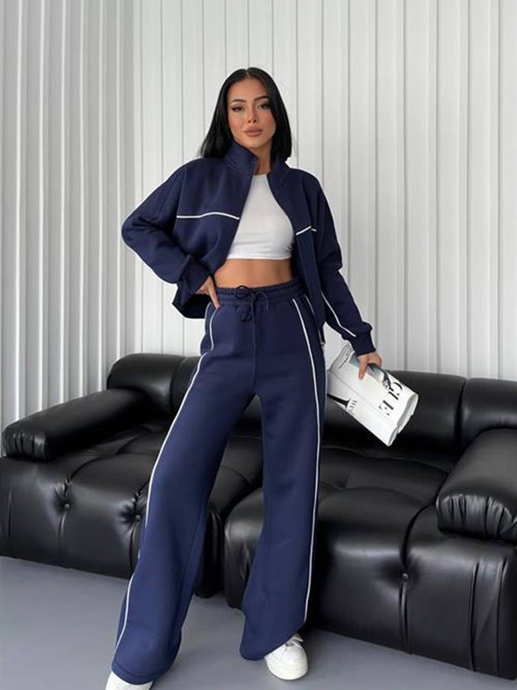 Damen lässiges Sweatset mit Stehkragen Reißverschluss gekürzter Jacke und hochtaillierter Schlaghose Nord Taschen