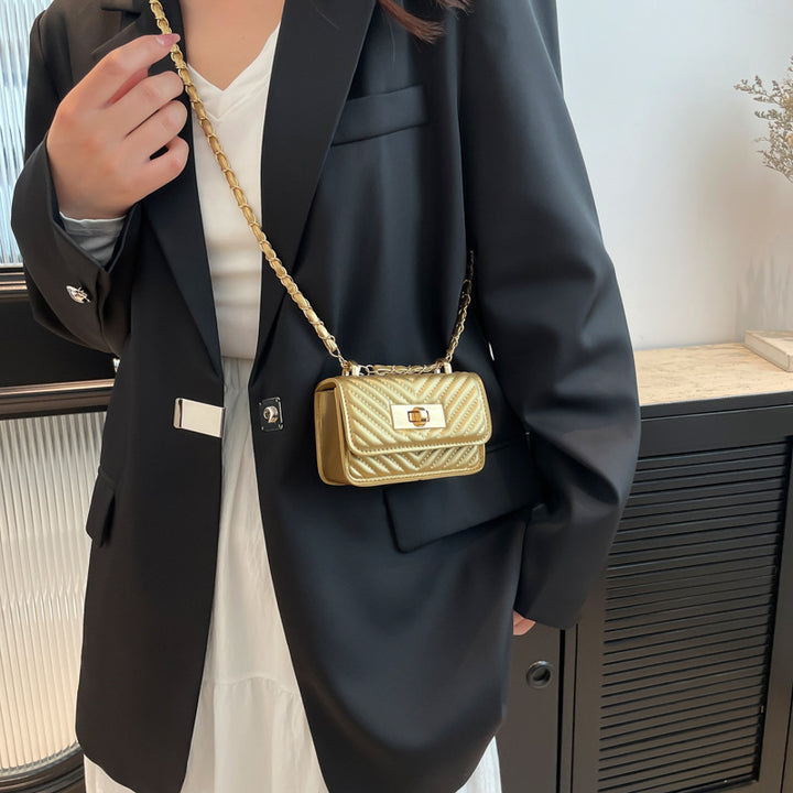 Damen Mini-Handtasche mit gestepptem Design und goldenem Verschluss Nord Taschen