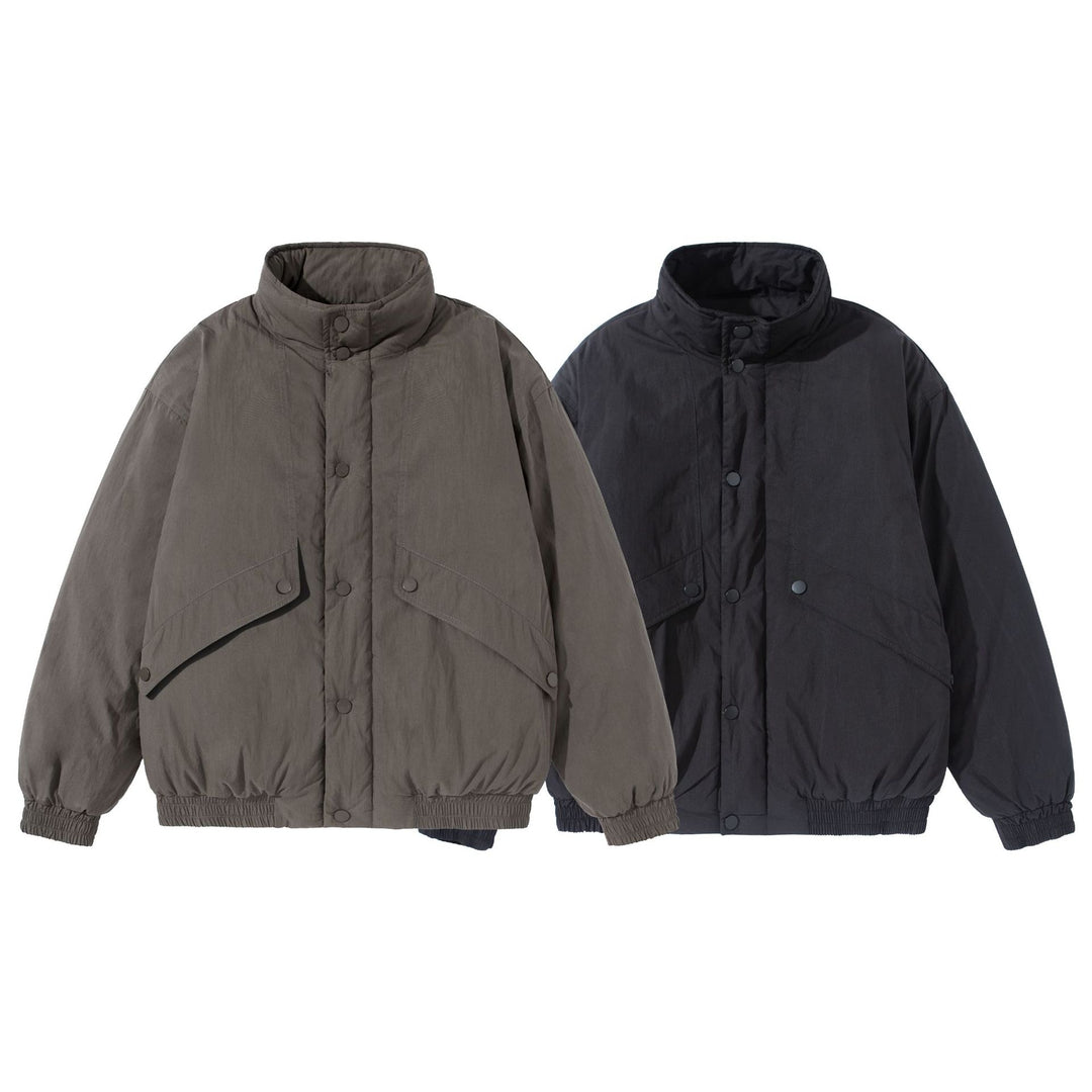 Unisex Kurz geschnittene gesteppte Boxy‑Blousonjacke mit hohem Stehkragen und Utility‑Flaptaschen Nord Taschen