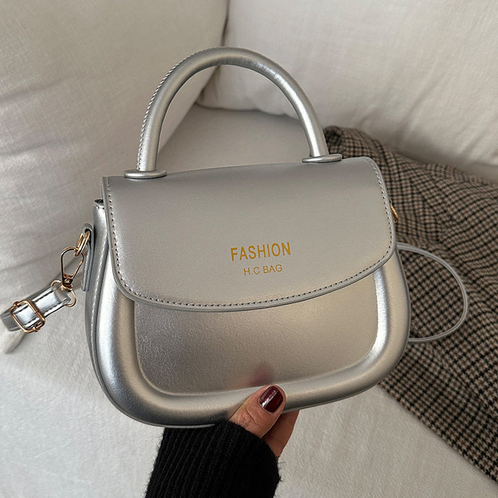 Damen Henkeltasche mit modernem Klappverschluss und eleganten Details Nord Taschen