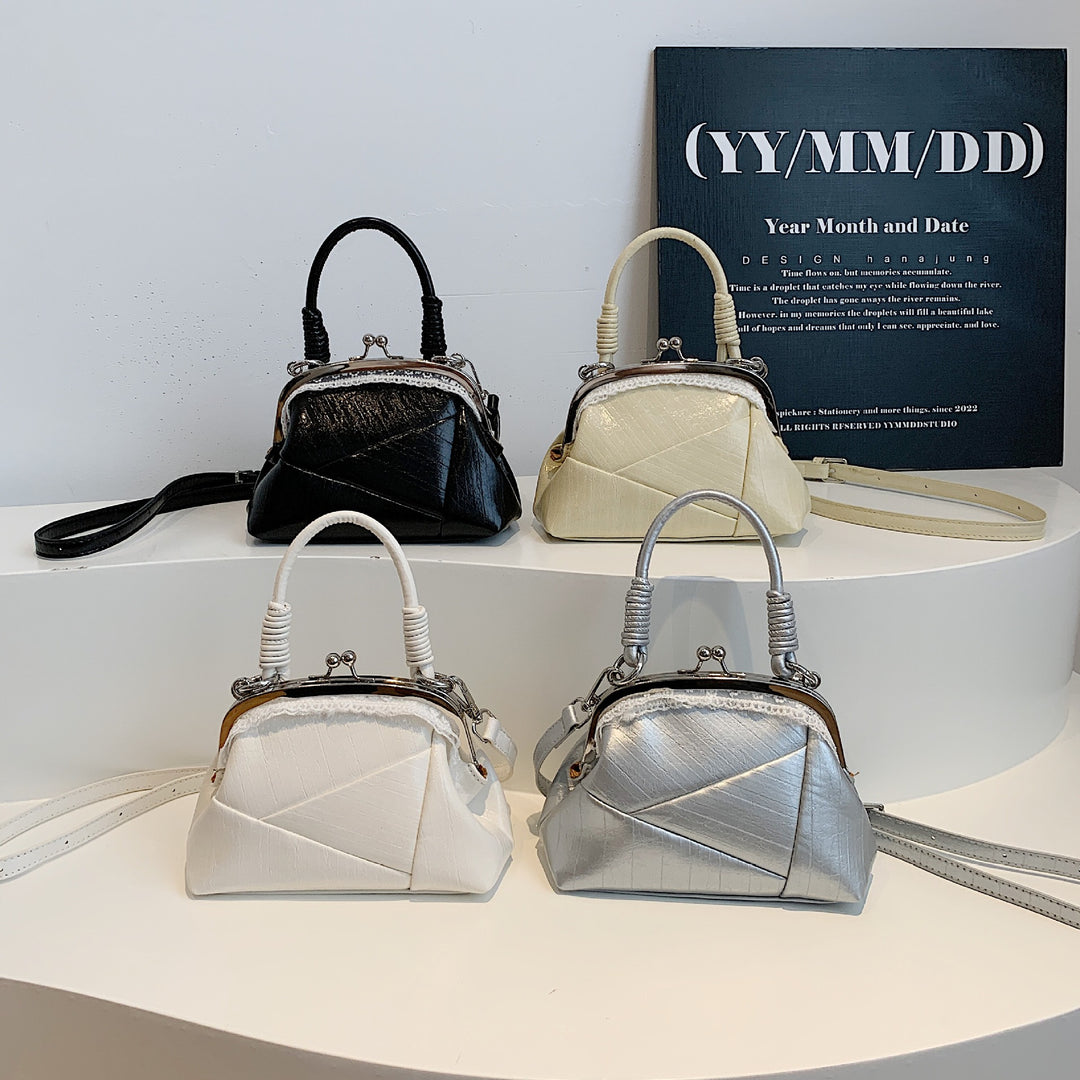 Damen elegante Umhängetasche mit stylischem Klappverschluss Nord Taschen