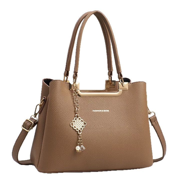 Damen klassische Handtasche mit dekorativem Anhänger Nord Taschen