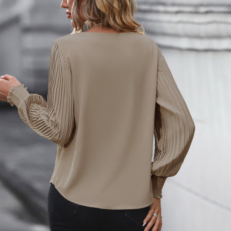 Damen V-Ausschnitt-Bluse mit plissierten Ballonärmeln und Smokbündchen Nord Taschen