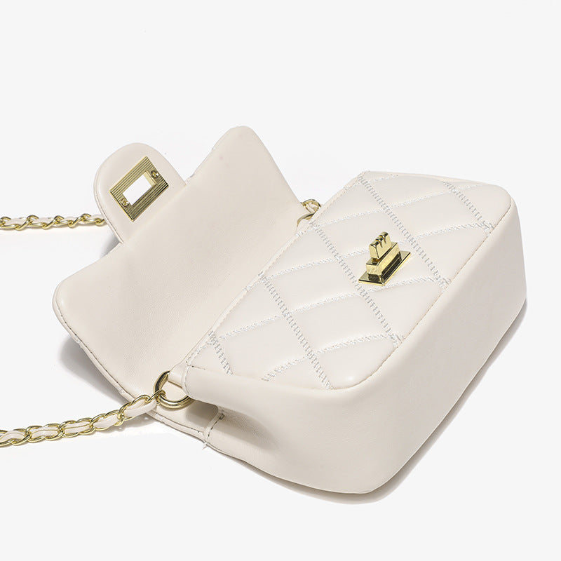 Damen elegante Schultertasche mit stilvoller Steppung und markanten Metallakzenten Nord Taschen
