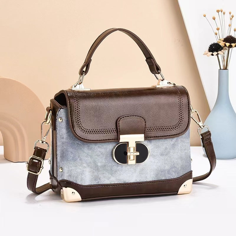 Damen Designer-Handtasche mit elegantem Klappenverschluss und stilvollem Haltegriff Nord Taschen