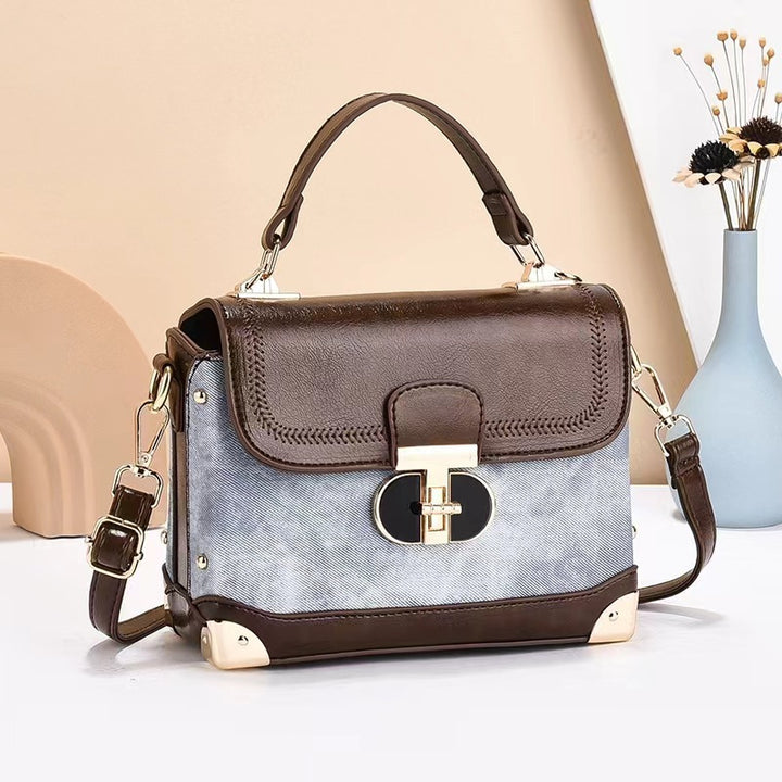 Damen Designer-Handtasche mit elegantem Klappenverschluss und stilvollem Haltegriff Nord Taschen