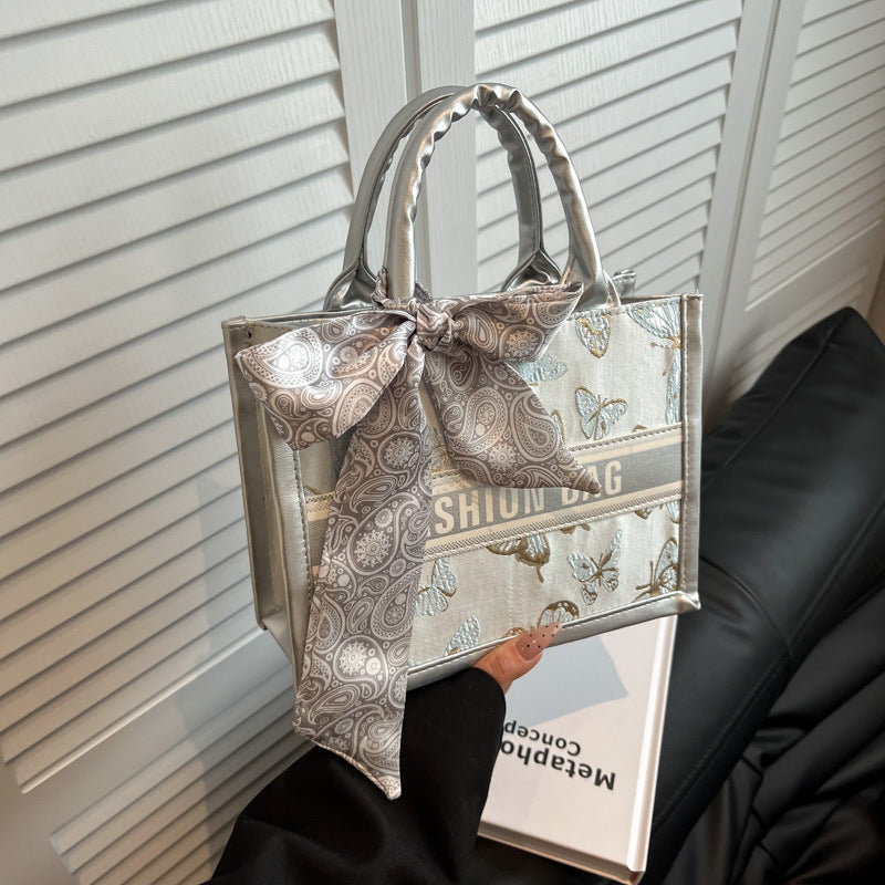 Damen Mini-Henkeltasche mit einzigartigem floralem Design und elegantem Schleifenakzent Nord Taschen