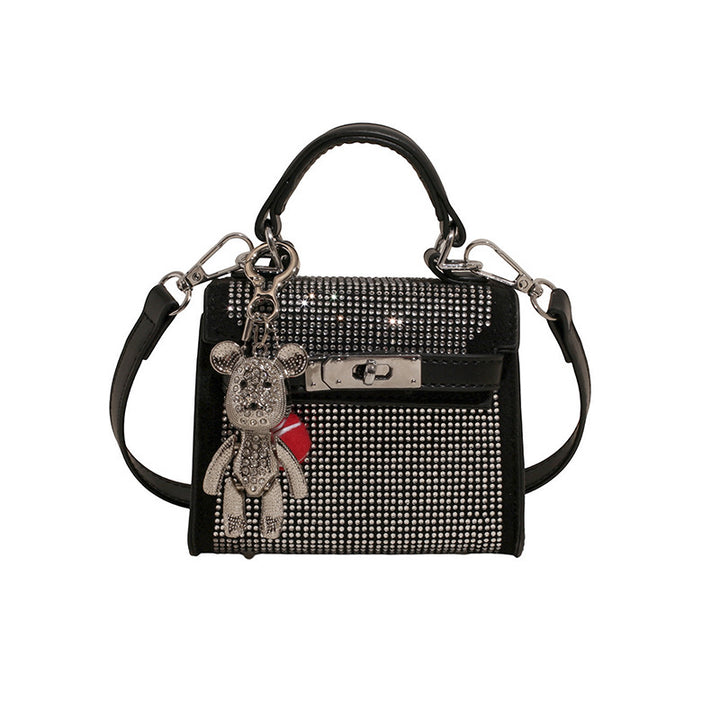 Damen Designer-Handtasche mit funkelndem Strass und verspieltem Anhänger | Nord Taschen