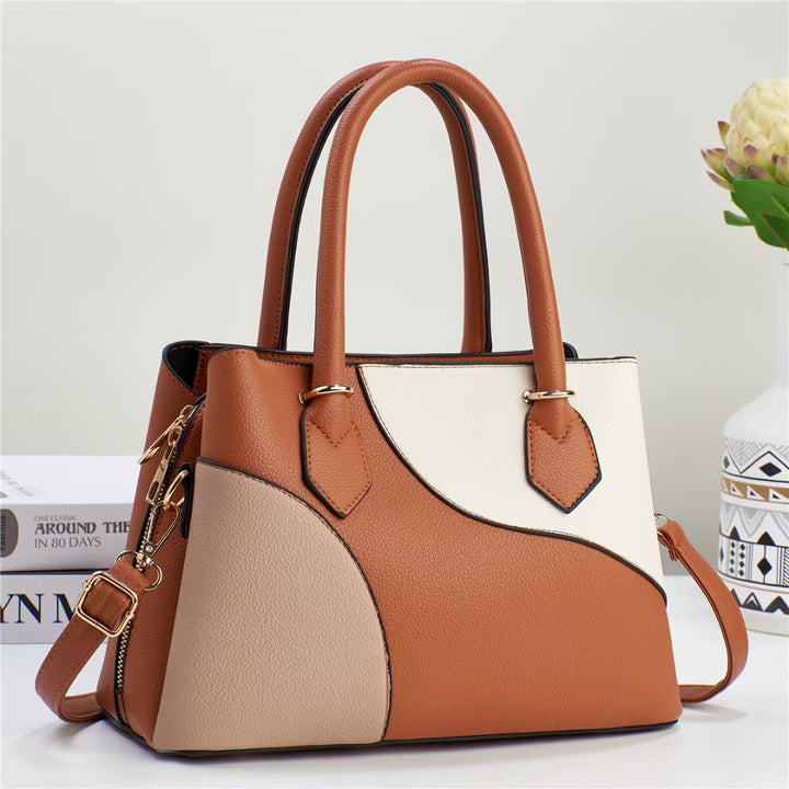Damen Handtasche mit kreativem Farbdesign und verstellbarem Schulterriemen Nord Taschen