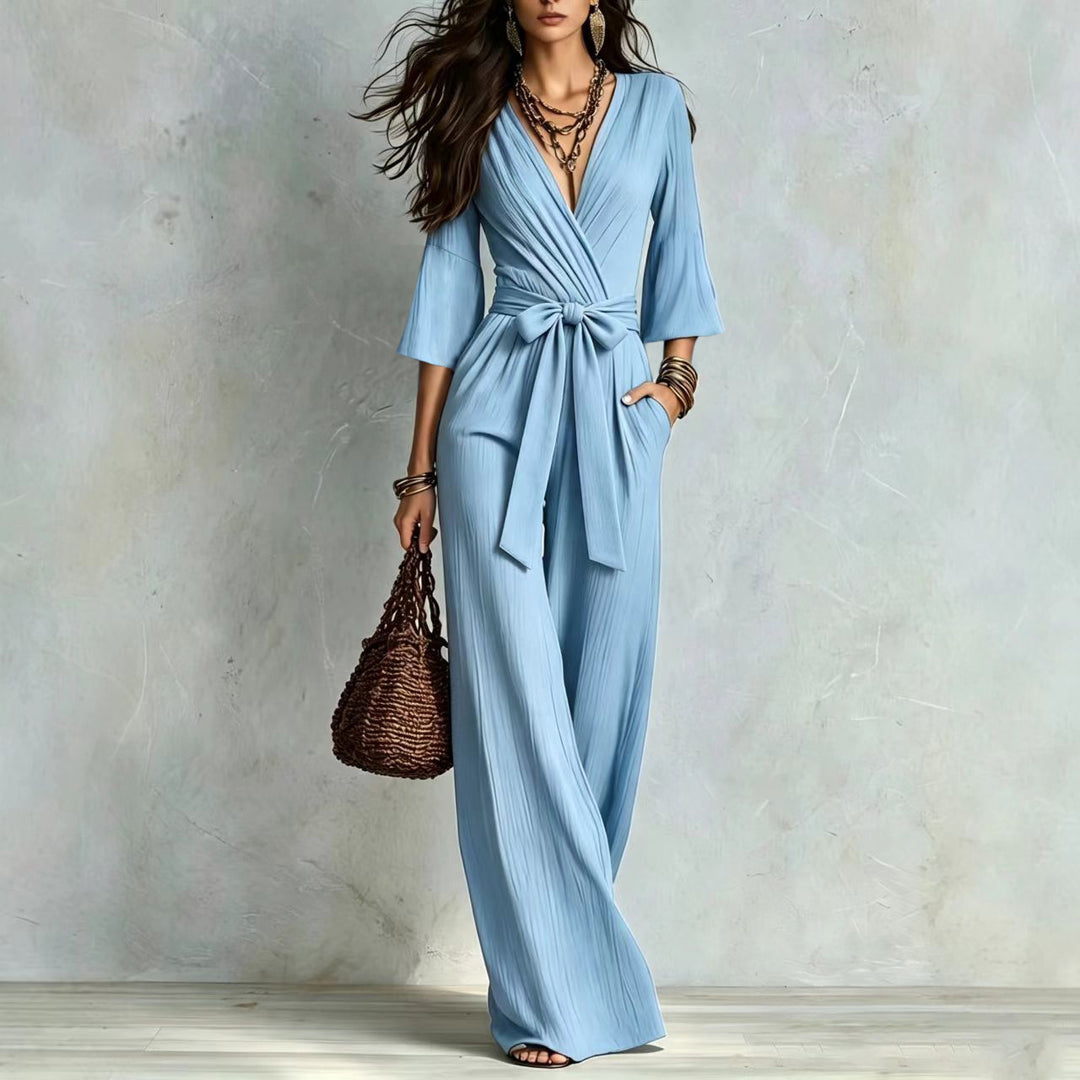 Damen Jumpsuit Wickel-Optik mit weitem Bein, Taillengürtel und Glockenärmeln Nord Taschen