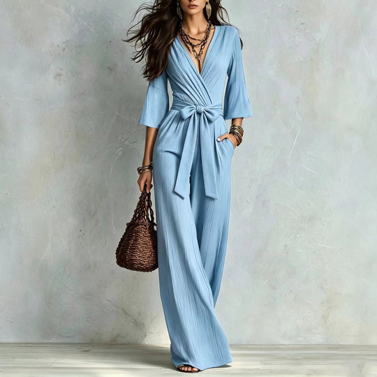 Damen Jumpsuit Wickel-Optik mit weitem Bein, Taillengürtel und Glockenärmeln Nord Taschen