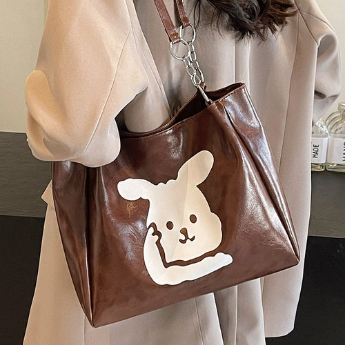Damen Umhängetasche aus hochwertigem Kunstleder mit verspieltem Tierdesign Nord Taschen