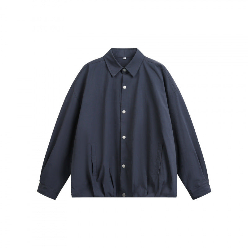 Unisex Boxy-Hemdjacke mit Druckknopfleiste, Hemdkragen und elastischem Saum Nord Taschen
