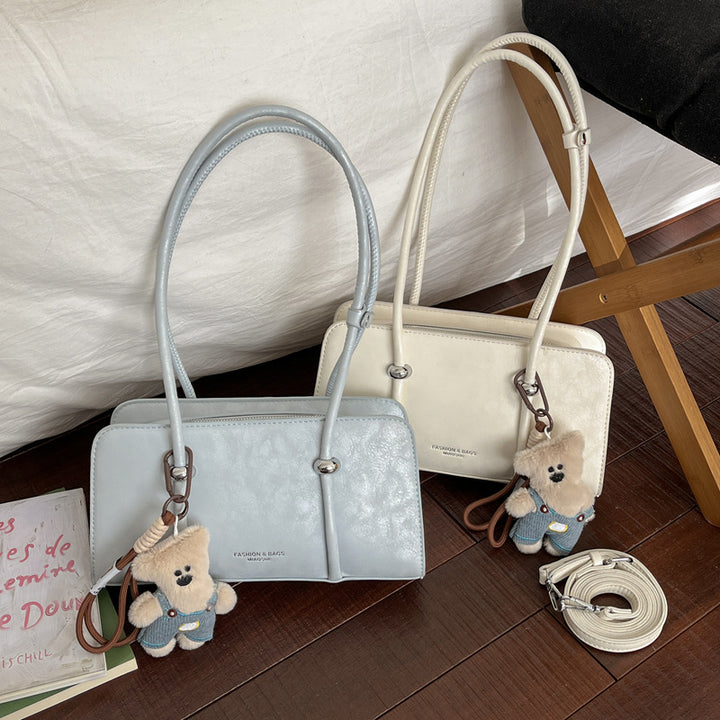 Damen Handtasche mit verspieltem Bärenanhänger Nord Taschen