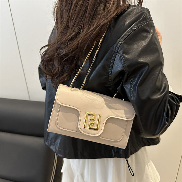 Damen elegante Umhängetasche mit goldenen Akzenten Nord Taschen