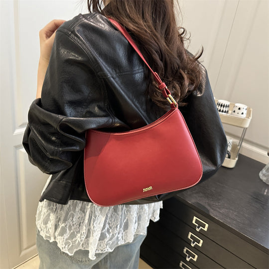 Damen elegante Umhängetasche mit geschwungenem Design und abnehmbarem Riemen Nord Taschen