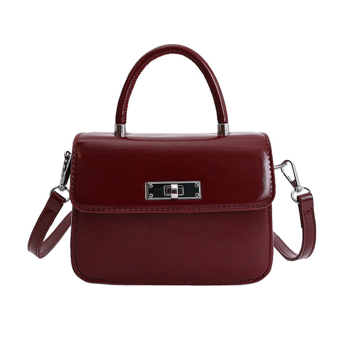 Damen Handtasche mit elegantem Kettenverschluss und abnehmbarem Schulterriemen Nord Taschen