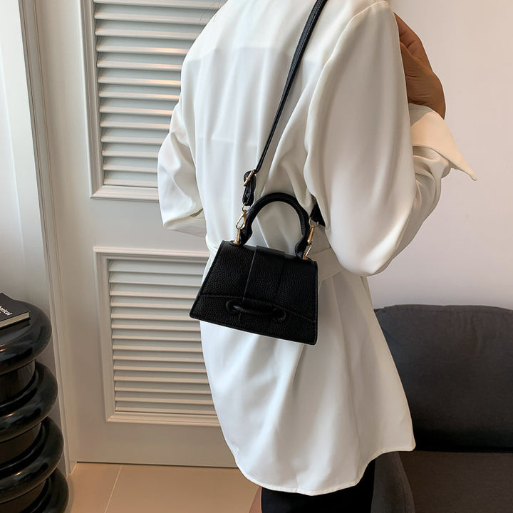 Damen Mini-Handtasche mit strukturiertem Leder und stilvollem Verschluss Nord Taschen