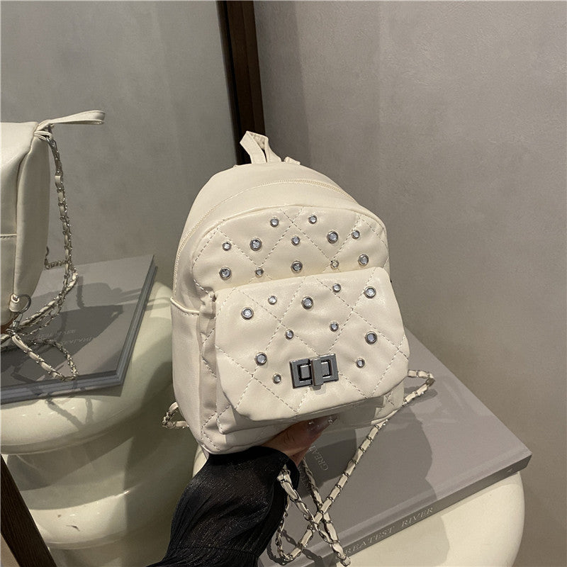 Damen Mini-Rucksackhandtasche mit eleganter Steppung und funkelnden Akzenten Nord Taschen