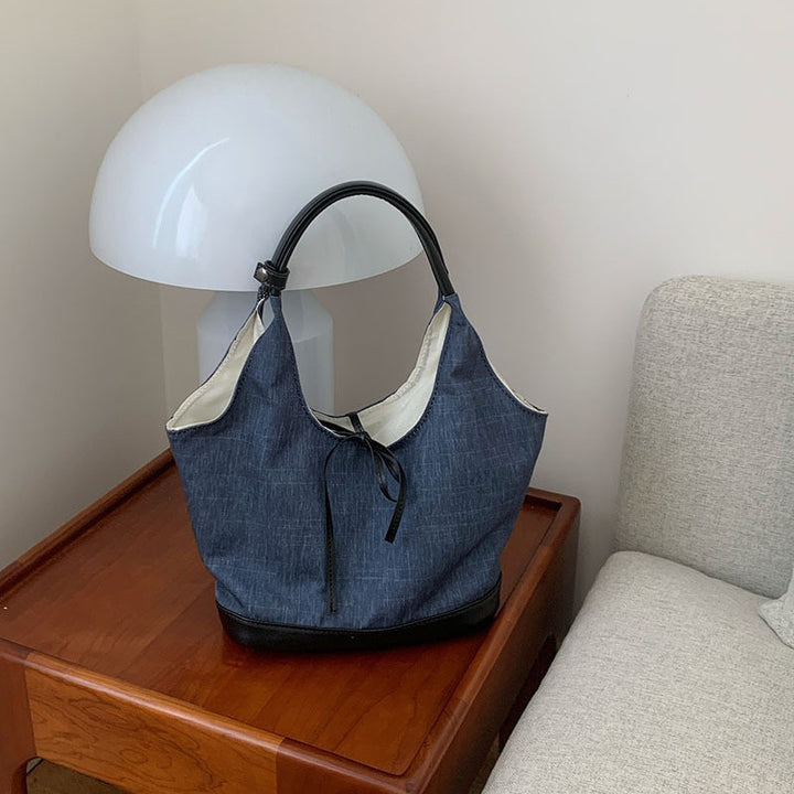 Damen Hobo-Tasche aus hochwertigem Material mit dekorativem Bindegürtel Nord Taschen