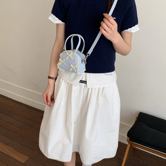 Damen modische Handtasche im verspielt romantischen Design mit Schleifenakzenten Nord Taschen