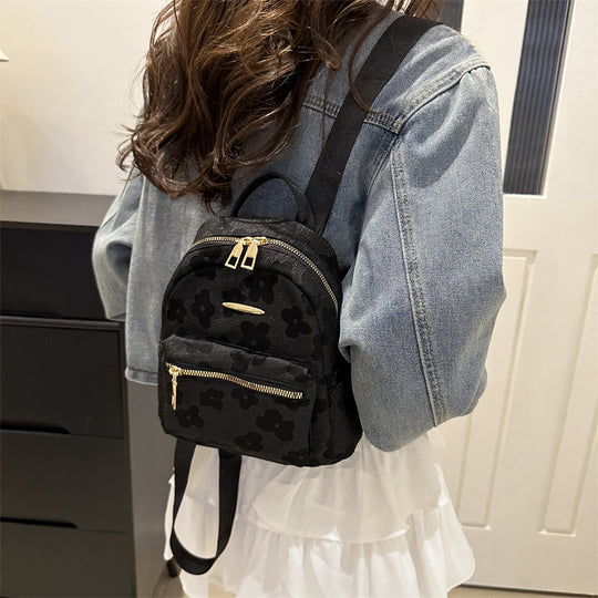 Damen Rucksack mit floralem Design und praktischem Reißverschluss Nord Taschen