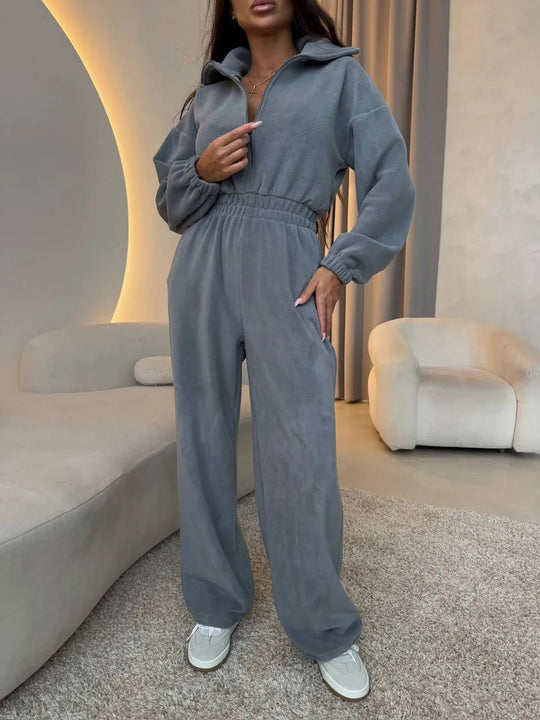 Damen eleganter Lounge-Overall mit elastischer Taillenpartie, Stehkragen, Reißverschluss und weitem Bein Nord Taschen