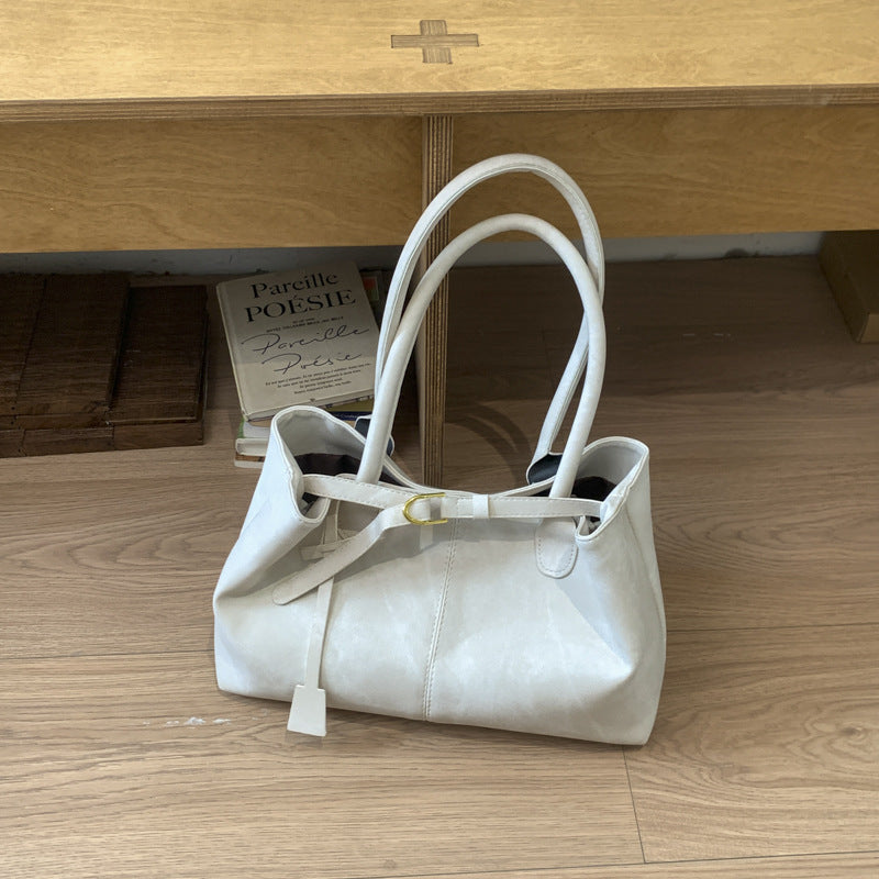 Damen elegante Henkeltasche mit strukturiertem Design und modernem Verschluss Nord Taschen