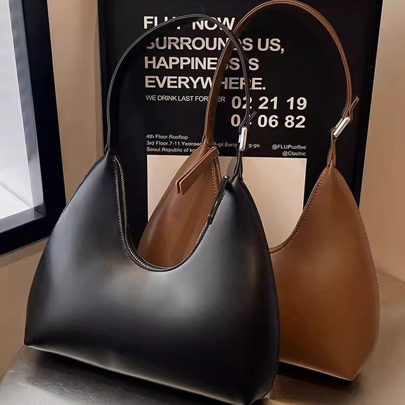Damen Hobo-Tasche mit elegantem, geschwungenem Design und hochwertiger Oberfläche Nord Taschen