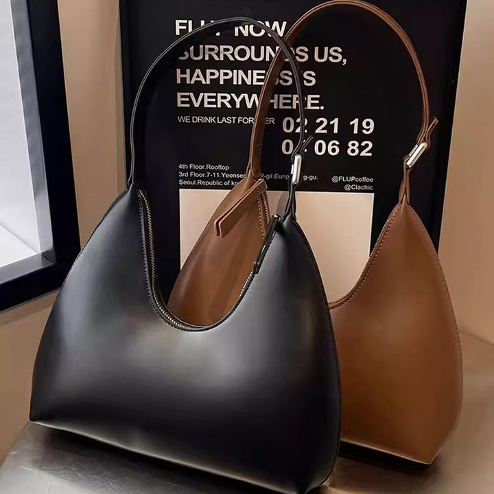 Damen Hobo-Tasche mit elegantem, geschwungenem Design und hochwertiger Oberfläche Nord Taschen