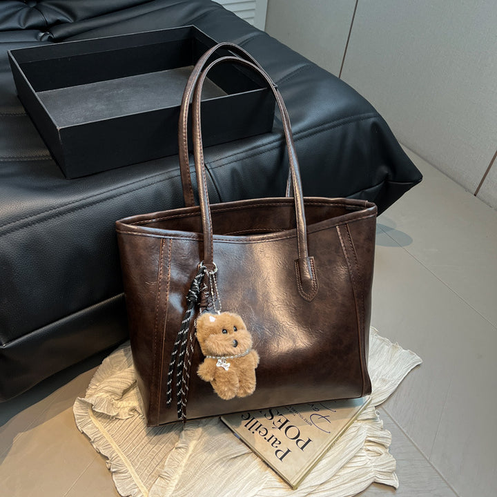 Damen elegante Shopper-Tasche mit verspieltem Anhänger Nord Taschen