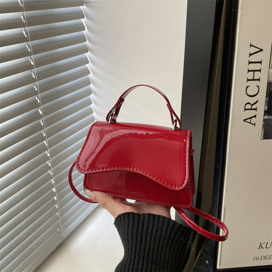 Damen Mini-Handtasche mit glänzendem Design Nord Taschen