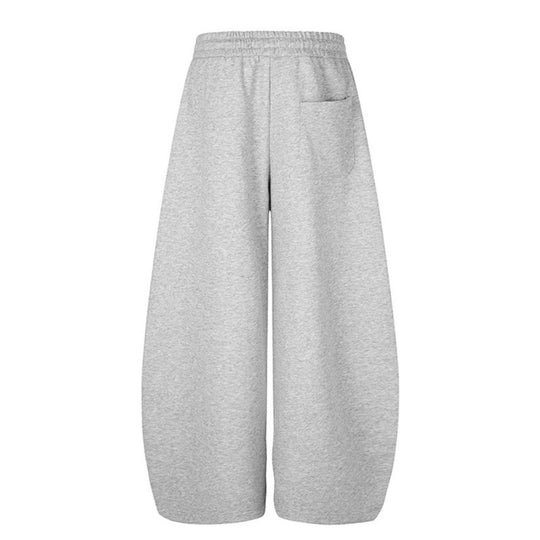 Damen Weite Midilounge‑Sweathose im Palazzo‑Cut mit Tunnelzug, Zip‑Saum und Statement‑Print Nord Taschen