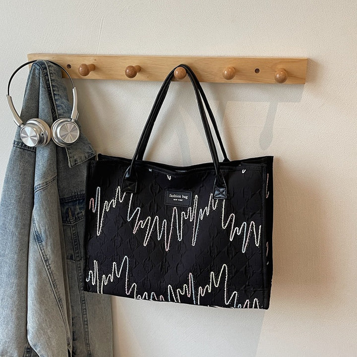 Damen modebewusste Tragetasche mit stilvollem Wellenmuster Nord Taschen
